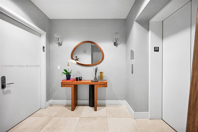 17121 Collins Ave Unit 2304, Sunny Isles Beach, FL 33160 - corridor featuring elevator and light tile patterned floors