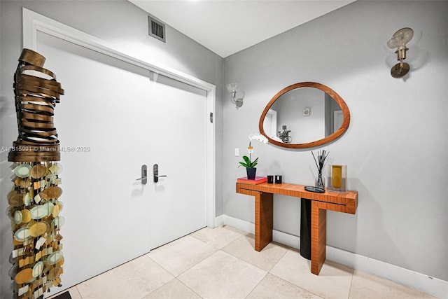 17121 Collins Ave Unit 2304, Sunny Isles Beach, FL 33160 - entrance foyer with light tile patterned flooring