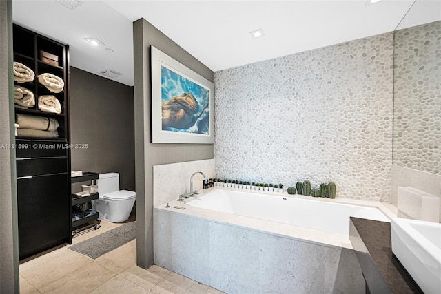 17121 Collins Ave Unit 2304, Sunny Isles Beach, FL 33160 - bathroom with a bath and tile patterned flooring