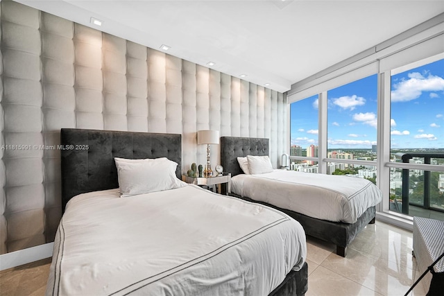 17121 Collins Ave Unit 2304, Sunny Isles Beach, FL 33160 - bedroom featuring expansive windows, recessed lighting, and light tile patterned flooring