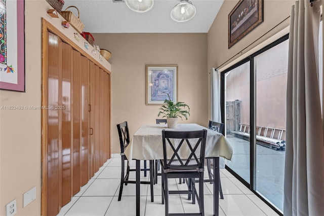 14548 SW 98th Ter, Miami, FL 33186 - dining room featuring light tile patterned floors
