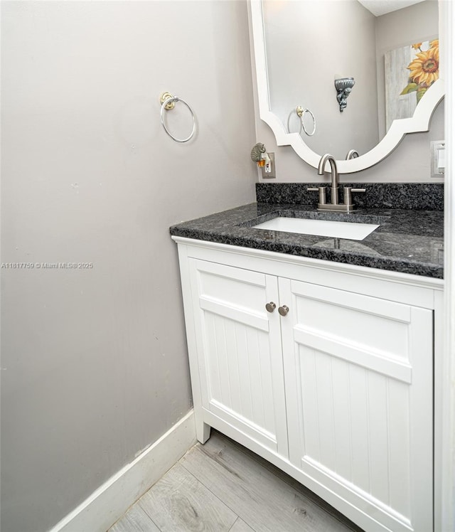 13290 SW 54th Ct, Miramar, FL 33027 - bathroom with vanity and wood finished floors