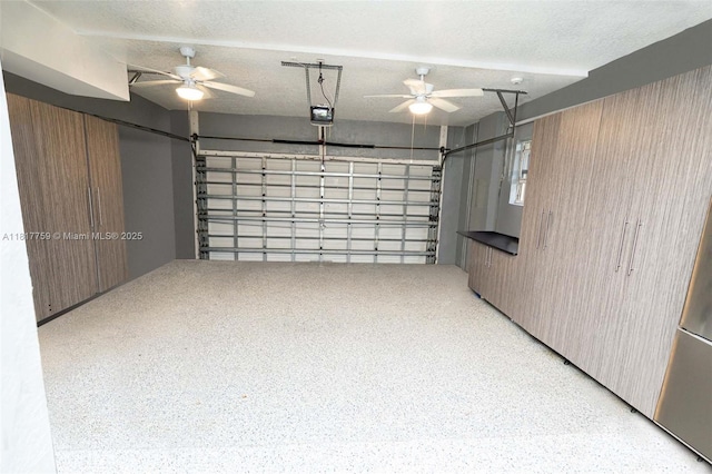 13290 SW 54th Ct, Miramar, FL 33027 - garage with a garage door opener and ceiling fan