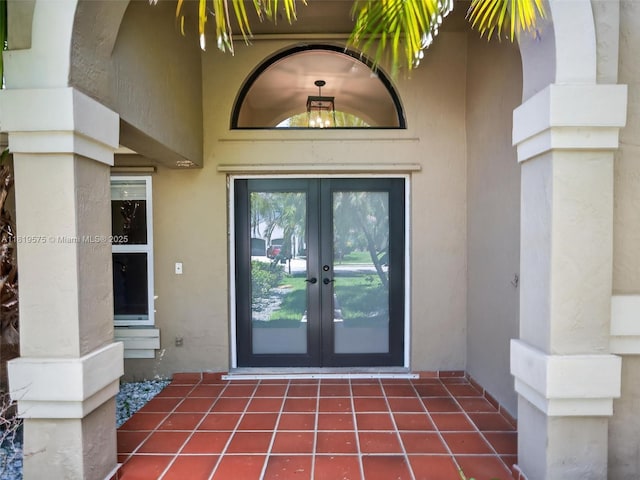 782 Lake Blvd, Weston, FL 33326 - property entrance with french doors and stucco siding