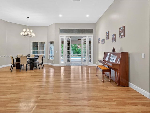 782 Lake Blvd, Weston, FL 33326 - dining space with light wood-style flooring, a chandelier, and recessed lighting