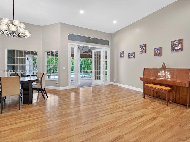 782 Lake Blvd, Weston, FL 33326 - dining area with light wood-style floors, a chandelier, recessed lighting, and french doors