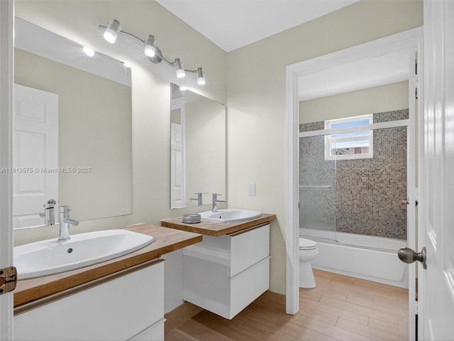 782 Lake Blvd, Weston, FL 33326 - bathroom with vanity, shower / bath combination with glass door, and wood finished floors