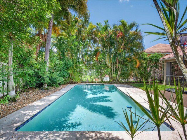 782 Lake Blvd, Weston, FL 33326 - view of pool with a fenced backyard