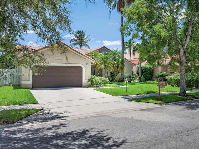 782 Lake Blvd, Weston, FL 33326 - view of front of house featuring stucco siding, a tiled roof, an attached garage, and driveway