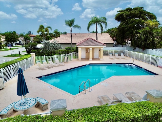 535 SW 181st Way, Pembroke Pines, FL 33029 - community pool featuring a patio