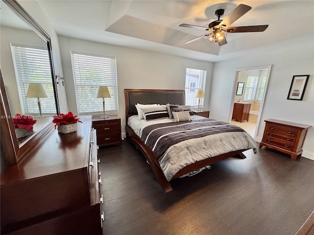 535 SW 181st Way, Pembroke Pines, FL 33029 - bedroom featuring a tray ceiling, connected bathroom, and a ceiling fan