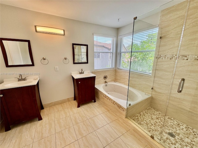 535 SW 181st Way, Pembroke Pines, FL 33029 - bathroom featuring a bath, a stall shower, two vanities, and tile patterned floors