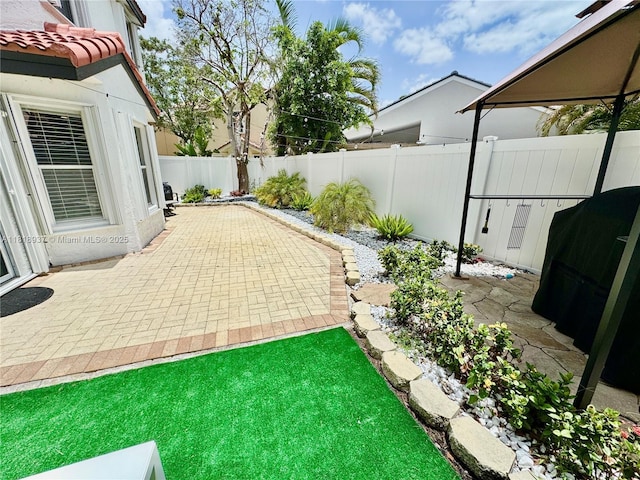 535 SW 181st Way, Pembroke Pines, FL 33029 - fenced backyard featuring a patio