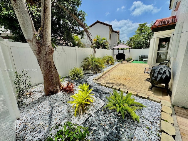 535 SW 181st Way, Pembroke Pines, FL 33029 - fenced backyard with a patio area