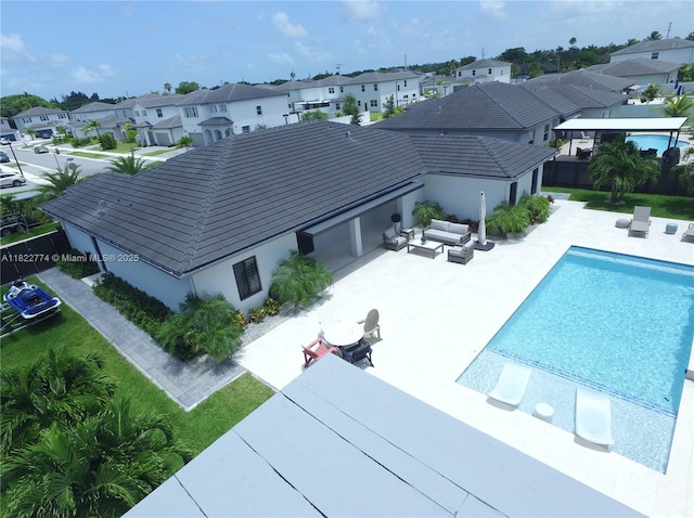 21420 SW 127th Pl, Miami, FL 33177 - outdoor pool with a residential view, an outdoor hangout area, and a patio area