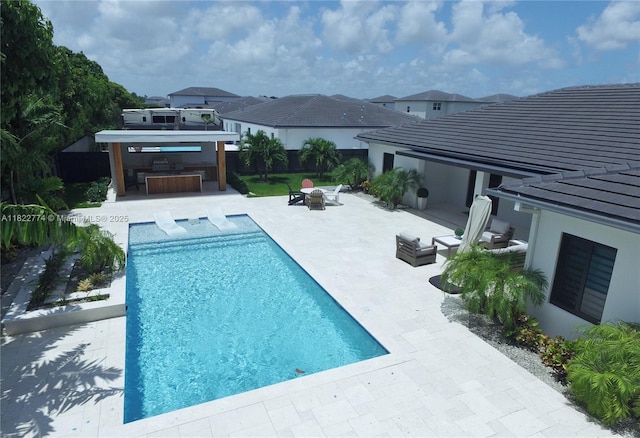21420 SW 127th Pl, Miami, FL 33177 - outdoor pool featuring a patio, an outdoor bar, and outdoor lounge area