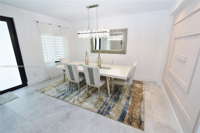 21420 SW 127th Pl, Miami, FL 33177 - dining area featuring a chandelier and baseboards