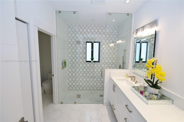 21420 SW 127th Pl, Miami, FL 33177 - bathroom with vanity, a shower stall, tile patterned flooring, and recessed lighting