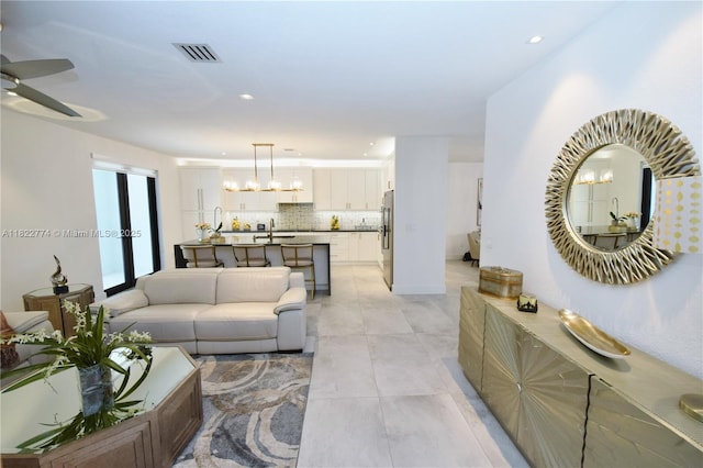 21420 SW 127th Pl, Miami, FL 33177 - living room with recessed lighting, a ceiling fan, and light tile patterned flooring