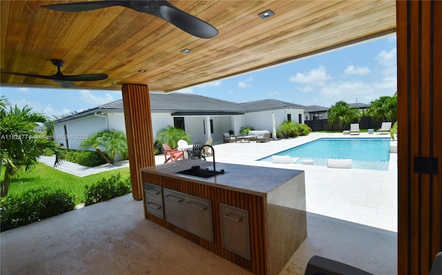 21420 SW 127th Pl, Miami, FL 33177 - view of swimming pool with a patio area, ceiling fan, and a bar