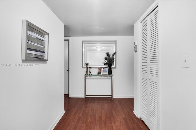 13953 Kendale Lakes Cir Unit 103B, Miami, FL 33183 - hall featuring wood finished floors and baseboards