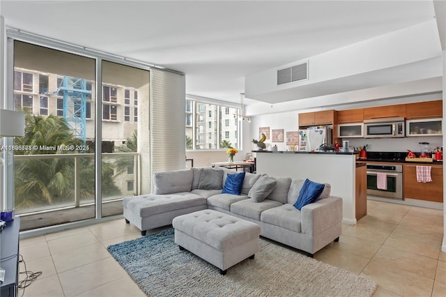 253 NE 2nd St Unit 1108, Miami, FL 33132 - living area featuring light tile patterned flooring