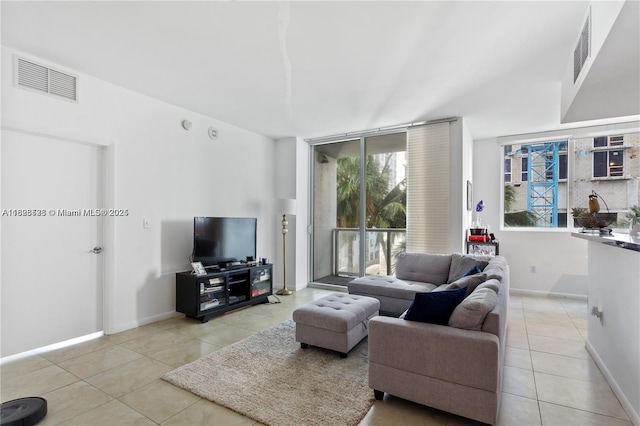 253 NE 2nd St Unit 1108, Miami, FL 33132 - tiled living area with baseboards