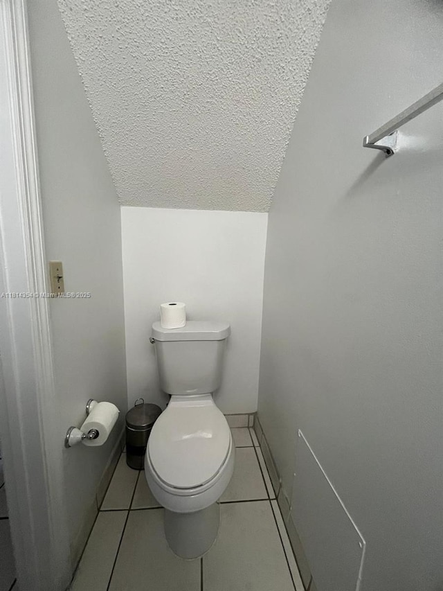 14901 SW 82nd Ter Unit 1-207, Miami, FL 33193 - bathroom featuring a textured ceiling and tile patterned floors