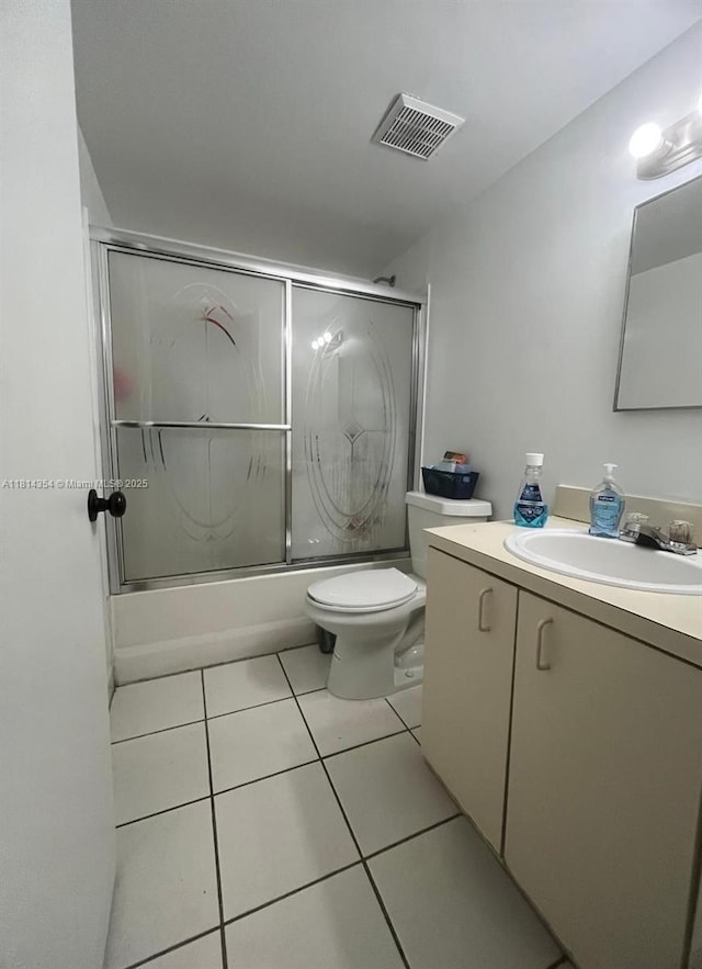 14901 SW 82nd Ter Unit 1-207, Miami, FL 33193 - full bath featuring vanity, tile patterned floors, and enclosed tub / shower combo