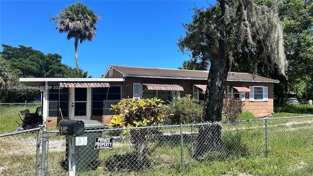 314 S 17th St, Fort Pierce, FL 34950 - view of front facade featuring a fenced front yard