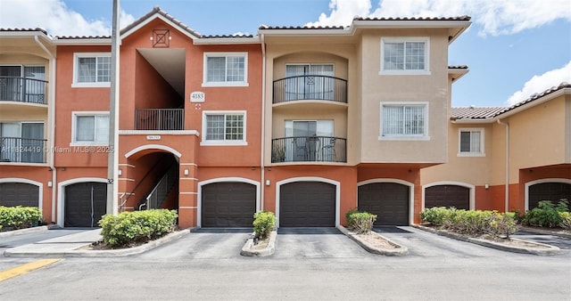 4183 N Haverhill Rd Unit 710, West Palm Beach, FL 33417 - view of property featuring an attached garage