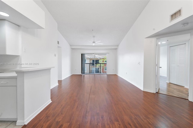 4183 N Haverhill Rd Unit 710, West Palm Beach, FL 33417 - unfurnished living room featuring a ceiling fan and wood finished floors