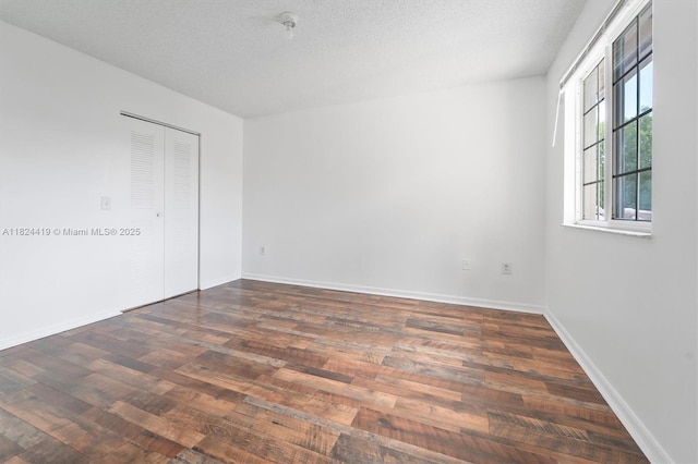 4183 N Haverhill Rd Unit 710, West Palm Beach, FL 33417 - empty room with wood finished floors and baseboards