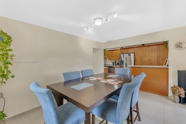 13705 SW 84th St Unit H, Miami, FL 33183 - dining space with light tile patterned flooring and baseboards