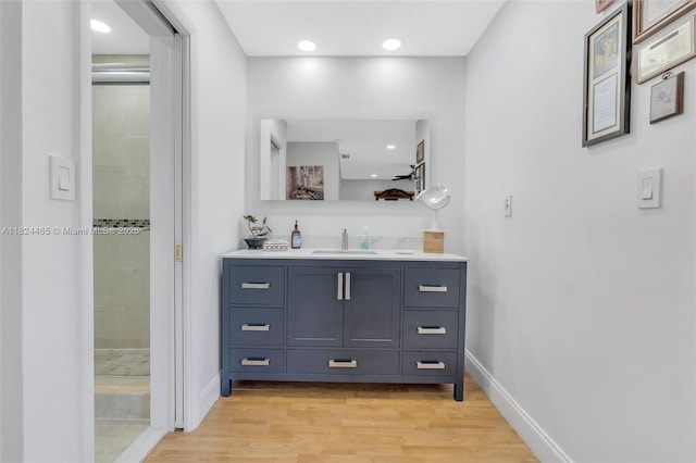 13705 SW 84th St Unit H, Miami, FL 33183 - full bath with vanity, wood finished floors, recessed lighting, and a tile shower