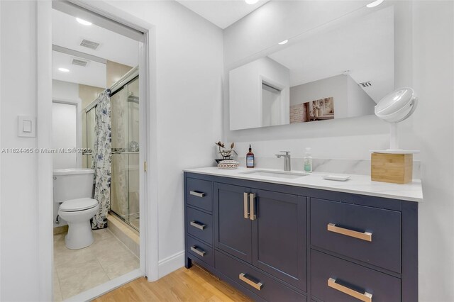 13705 SW 84th St Unit H, Miami, FL 33183 - full bath with a shower stall, vanity, and wood finished floors