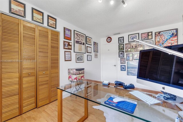 13705 SW 84th St Unit H, Miami, FL 33183 - office space featuring a textured ceiling and light wood finished floors