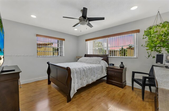13705 SW 84th St Unit H, Miami, FL 33183 - bedroom with multiple windows, light wood-style floors, a ceiling fan, and recessed lighting