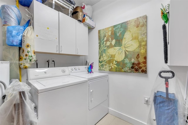 13705 SW 84th St Unit H, Miami, FL 33183 - laundry room with washing machine and clothes dryer, cabinet space, and light tile patterned flooring