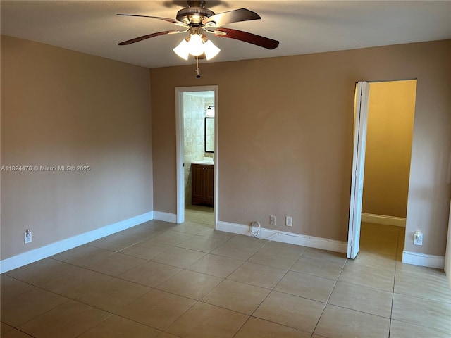5818 Swordfish Ct Unit D, Tamarac, FL 33319 - empty room with light tile patterned flooring and a ceiling fan