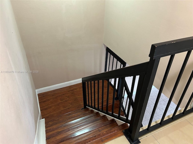 5818 Swordfish Ct Unit D, Tamarac, FL 33319 - staircase with wood finished floors and baseboards