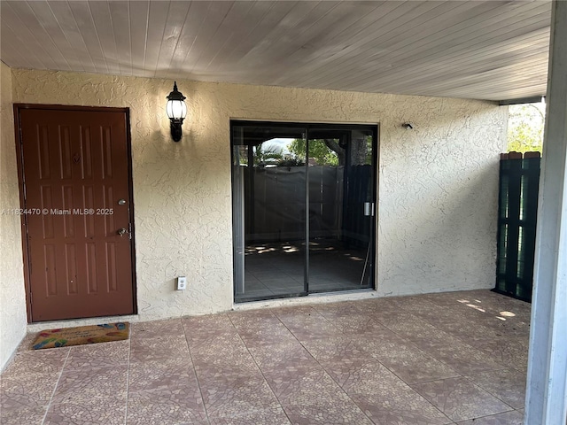 5818 Swordfish Ct Unit D, Tamarac, FL 33319 - doorway to property with stucco siding