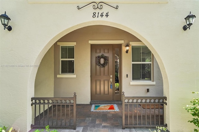 8144 Cascada Isles Dr, Cooper City, FL 33024 - property entrance with stucco siding