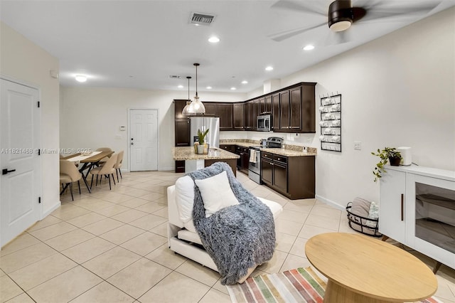 8144 Cascada Isles Dr, Cooper City, FL 33024 - living room with light tile patterned flooring, recessed lighting, and a ceiling fan