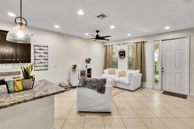 8144 Cascada Isles Dr, Cooper City, FL 33024 - living area with recessed lighting, ceiling fan, and light tile patterned flooring