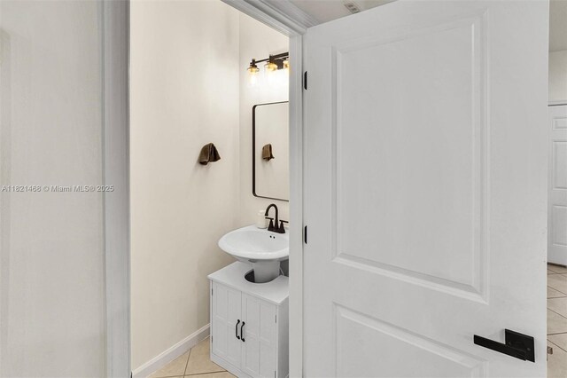 8144 Cascada Isles Dr, Cooper City, FL 33024 - bathroom with tile patterned floors and a sink