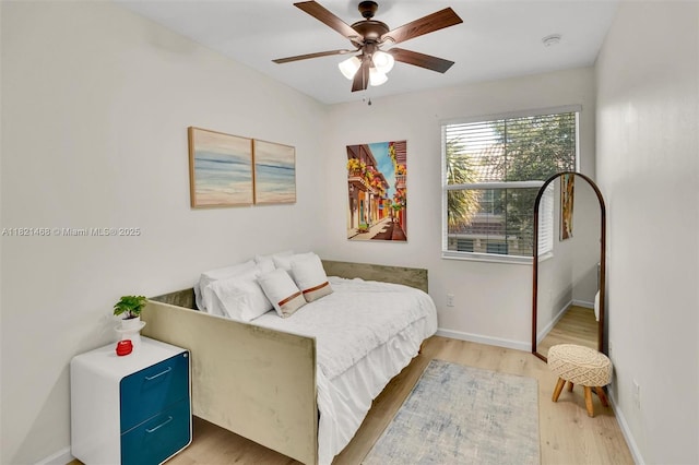8144 Cascada Isles Dr, Cooper City, FL 33024 - bedroom with light wood-type flooring and a ceiling fan