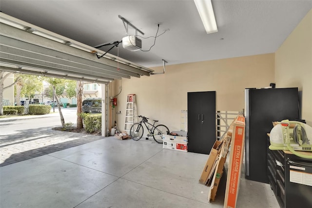 8144 Cascada Isles Dr, Cooper City, FL 33024 - garage featuring a garage door opener