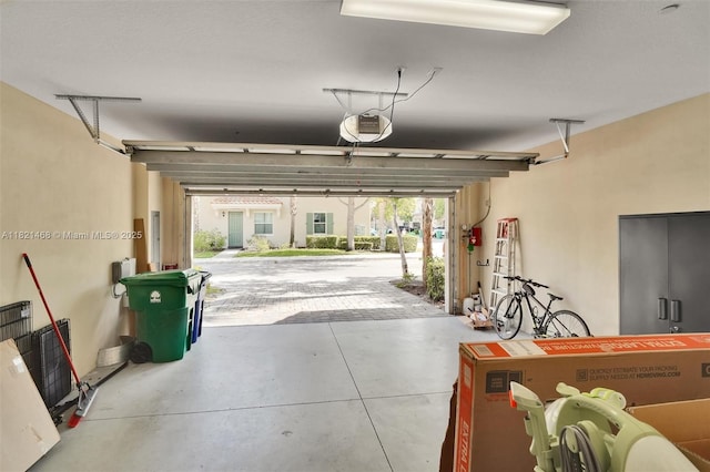 8144 Cascada Isles Dr, Cooper City, FL 33024 - garage with a garage door opener