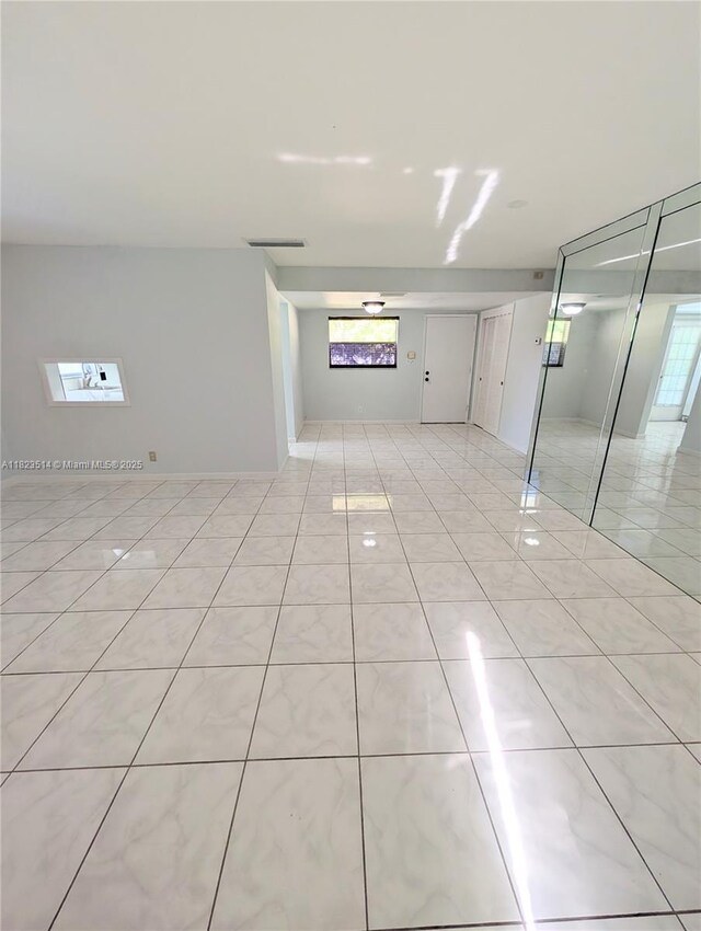14901 SW 4th St Unit 9A, Pembroke Pines, FL 33027 - unfurnished room with light tile patterned floors